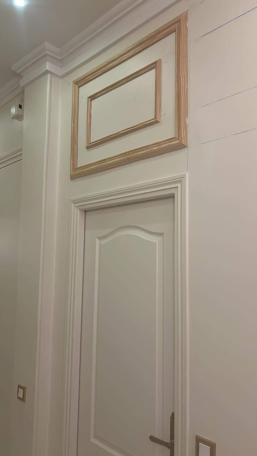 L’élégance des moulures en bois (Paris 7ème) L’Art de la Menuiserie au Service de votre Intérieur